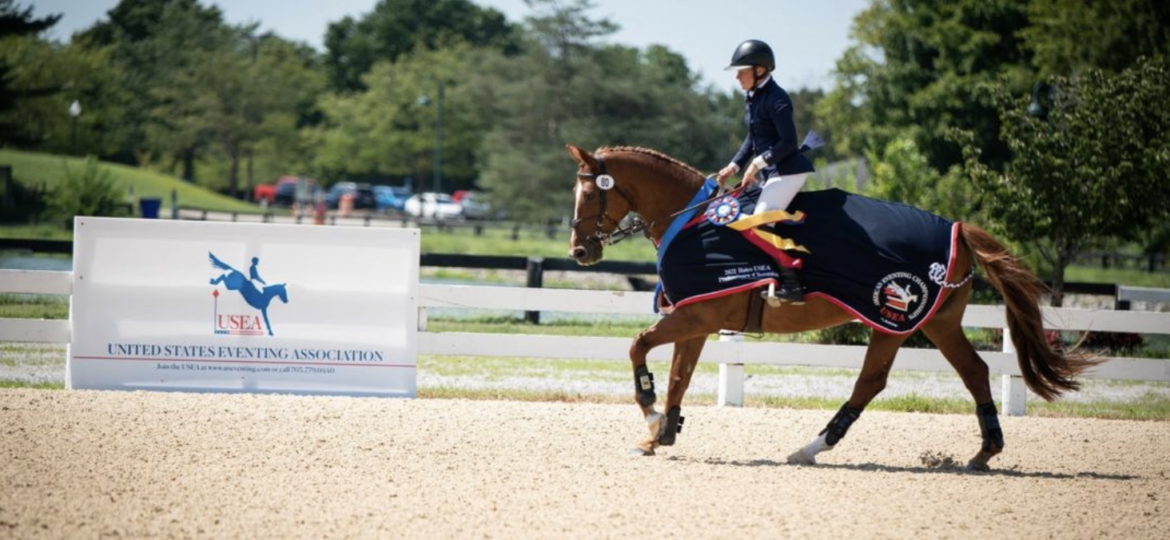 Woman riding a horse during the United States Eventing Association Event on 08.23.2023